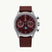 A luxury wristwatch with a silver-toned stainless steel case, a dark red dial featuring a moon phase indicator and the 'LEONACY' brand name, and a matching dark red leather strap.