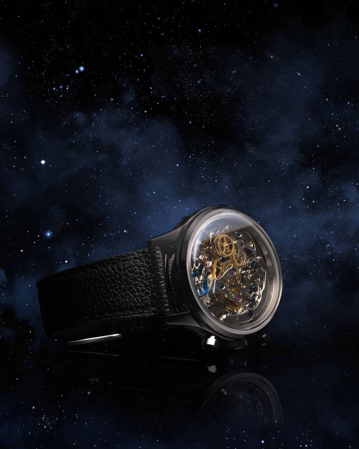A luxury skeleton watch with a black textured leather strap and a clear crystal case revealing intricate gold-toned mechanical gears, set against a dark starry space background.